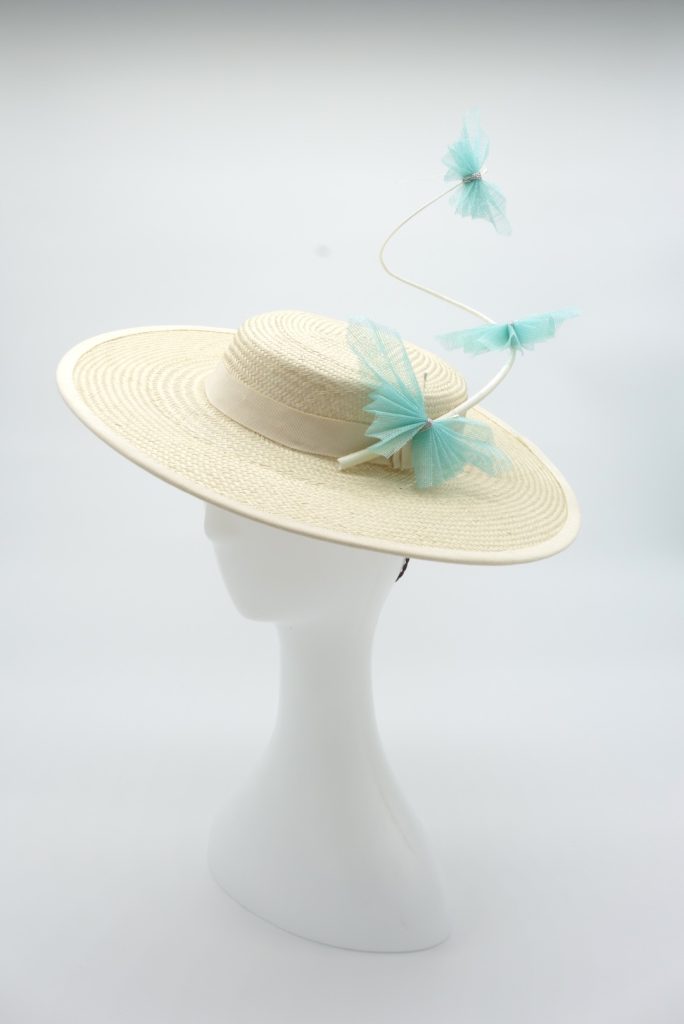 Ivory shallow boater hat with sculptural quill and aqua periwinkle origami butterflies by Sydney Milliner, Abigail Fergusson Millinery Australia
