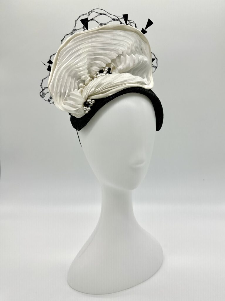 Derby Day spring racing millinery racewear style Black sinamay bandeau headband with pleated silk shibori ribbon, vintage style veiling, swarski crystals and pearls and black triangle feathers by Sydney milliner / Sydney hatmaker / Australian Milliner Abigail Fergusson Millinery