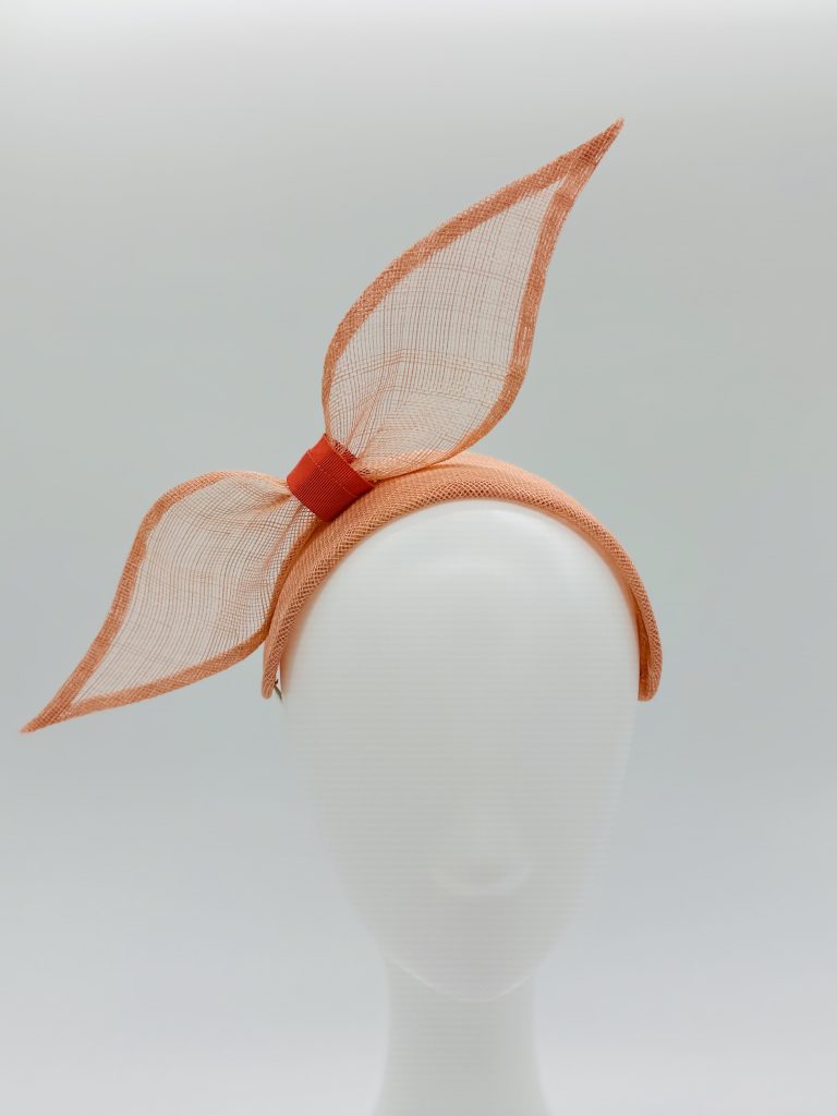 Coral sinamay bow headband bandeau racewear spring racing millinery by Australian milliner / Sydney milliner hat maker Abigail Fergusson Millinery