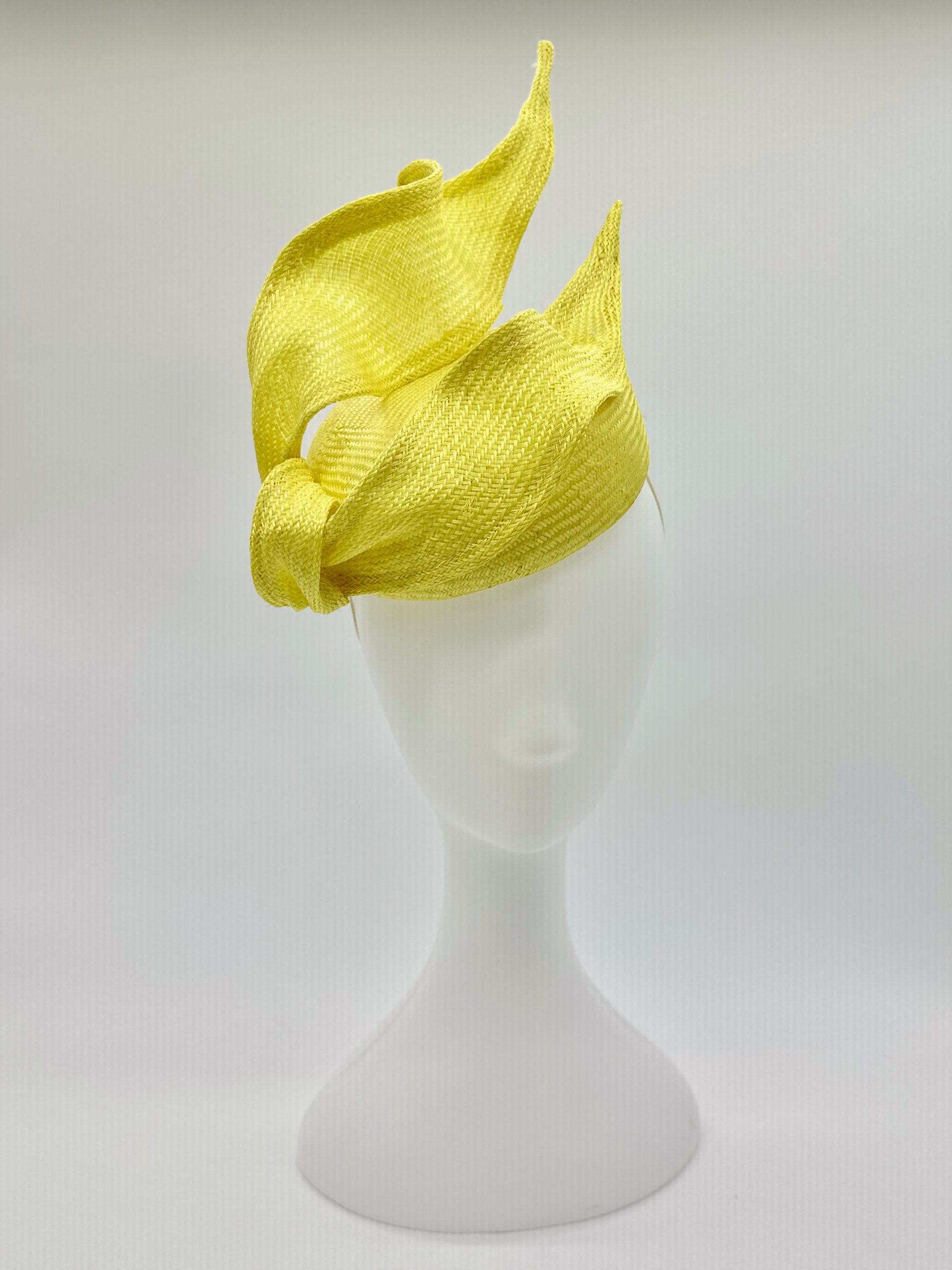 Spring Racing Millinery Racewear canary yellow parasisal straw duchess shaped cocktail hat with sculpted straw knot trim by Sydney Milliner Australian Milliner Hatmaker Abigail Fergusson Millinery