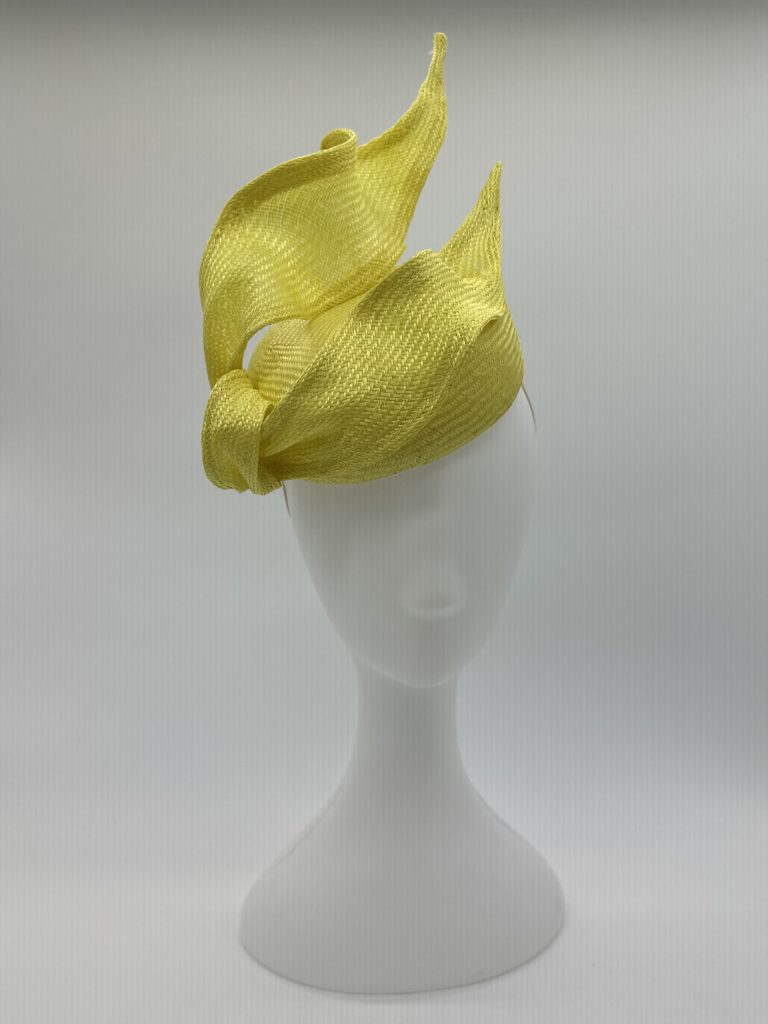 Spring Racing Millinery Racewear canary yellow parasisal straw duchess shaped cocktail hat with sculpted straw knot trim by Sydney Milliner Australian Milliner Hatmaker Abigail Fergusson Millinery