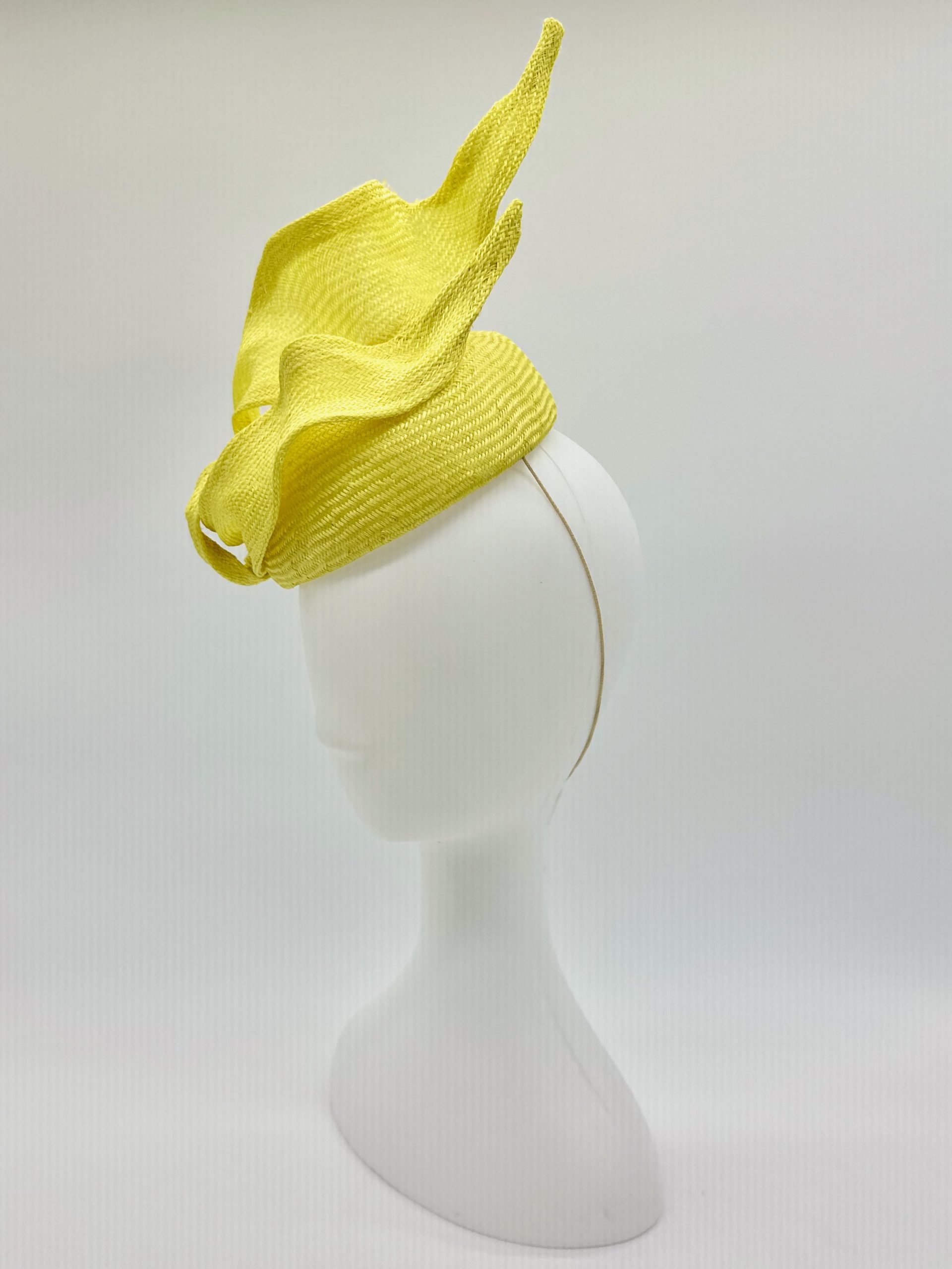 Spring Racing Millinery Racewear canary yellow parasisal straw duchess shaped cocktail hat with sculpted straw knot trim by Sydney Milliner Australian Milliner Hatmaker Abigail Fergusson Millinery
