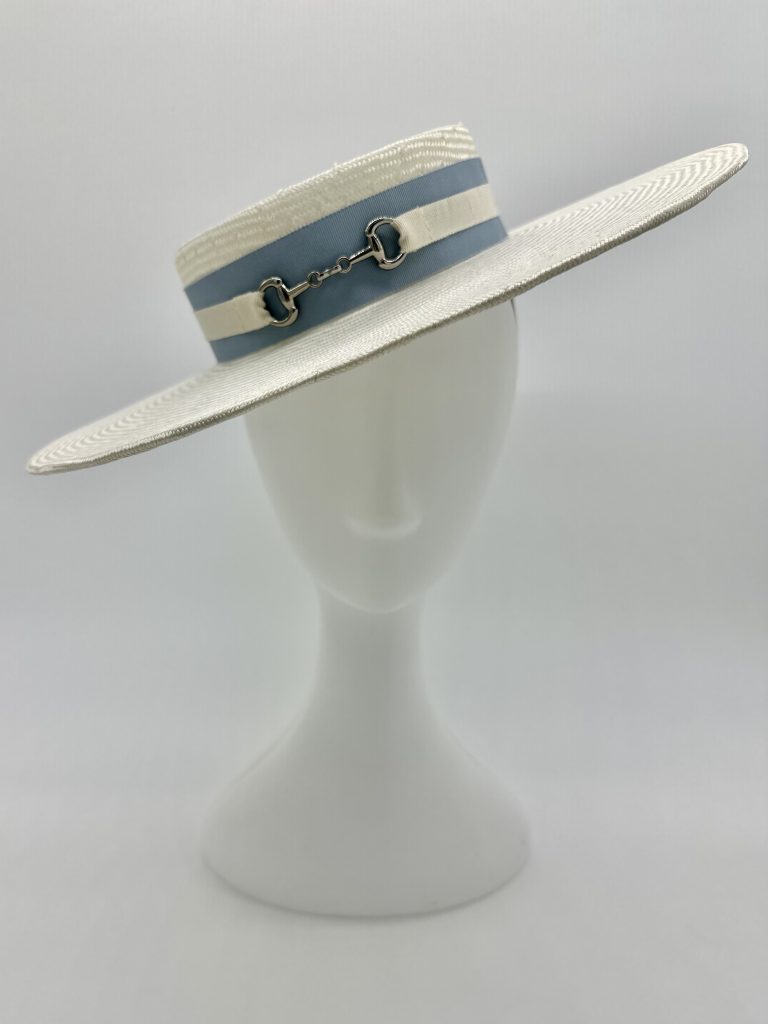 Polo In the city Urban Polo Spring racing millinery racewear white parasisal straw boater hat with porkpie crown trimmed blue and ivory hatband with silver horse snaffle stirrup saddle bit trim buckle by Australian Milliner / Sydney Milliner Hat Maker, Abigail Fergusson Millinery