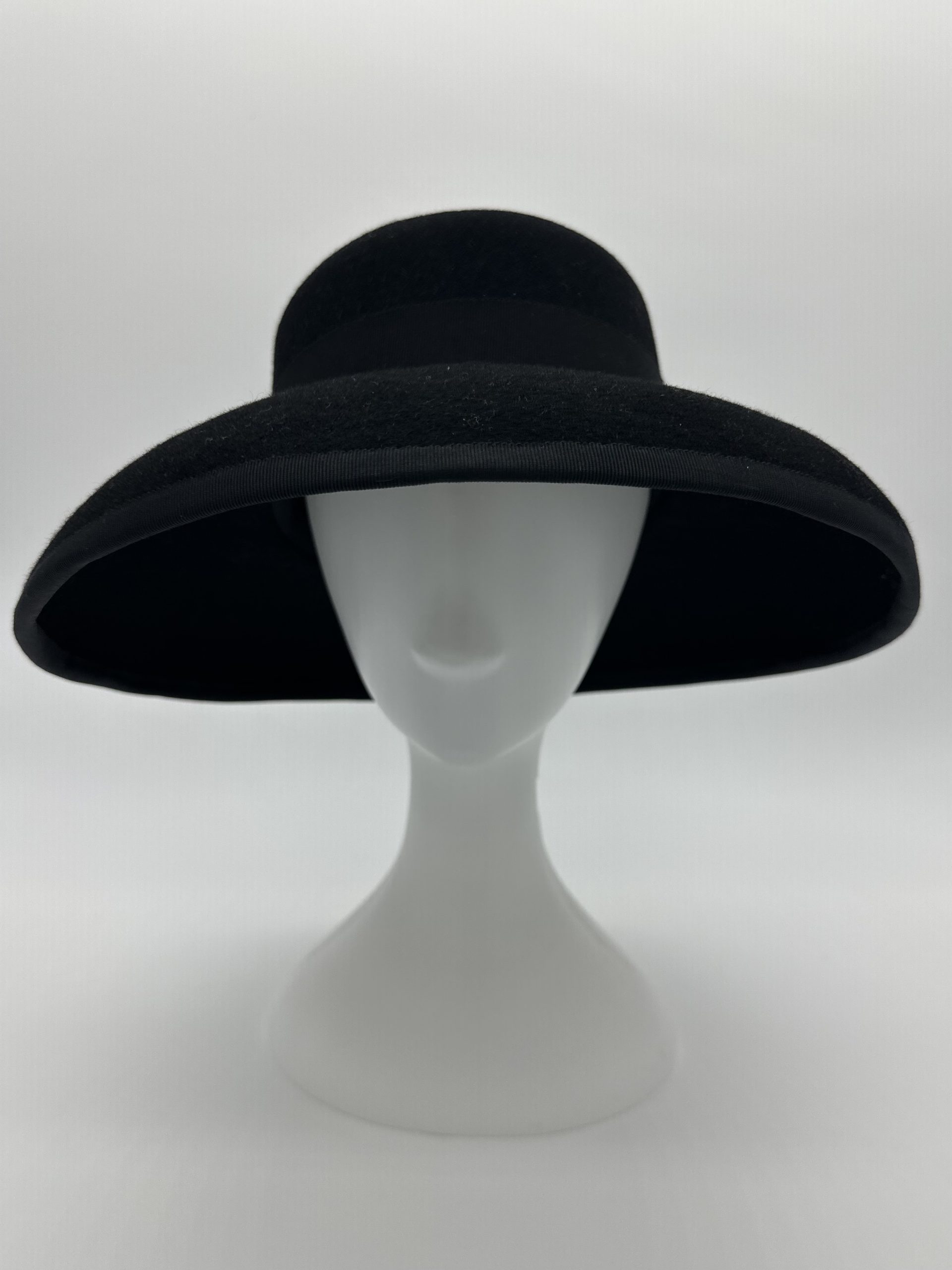 Black felt drop brim hat inspired by Audrey Hepburn in Breakfast at Tiffanys by Australian milliner Sydney milliner Abigail Fergusson Millinery