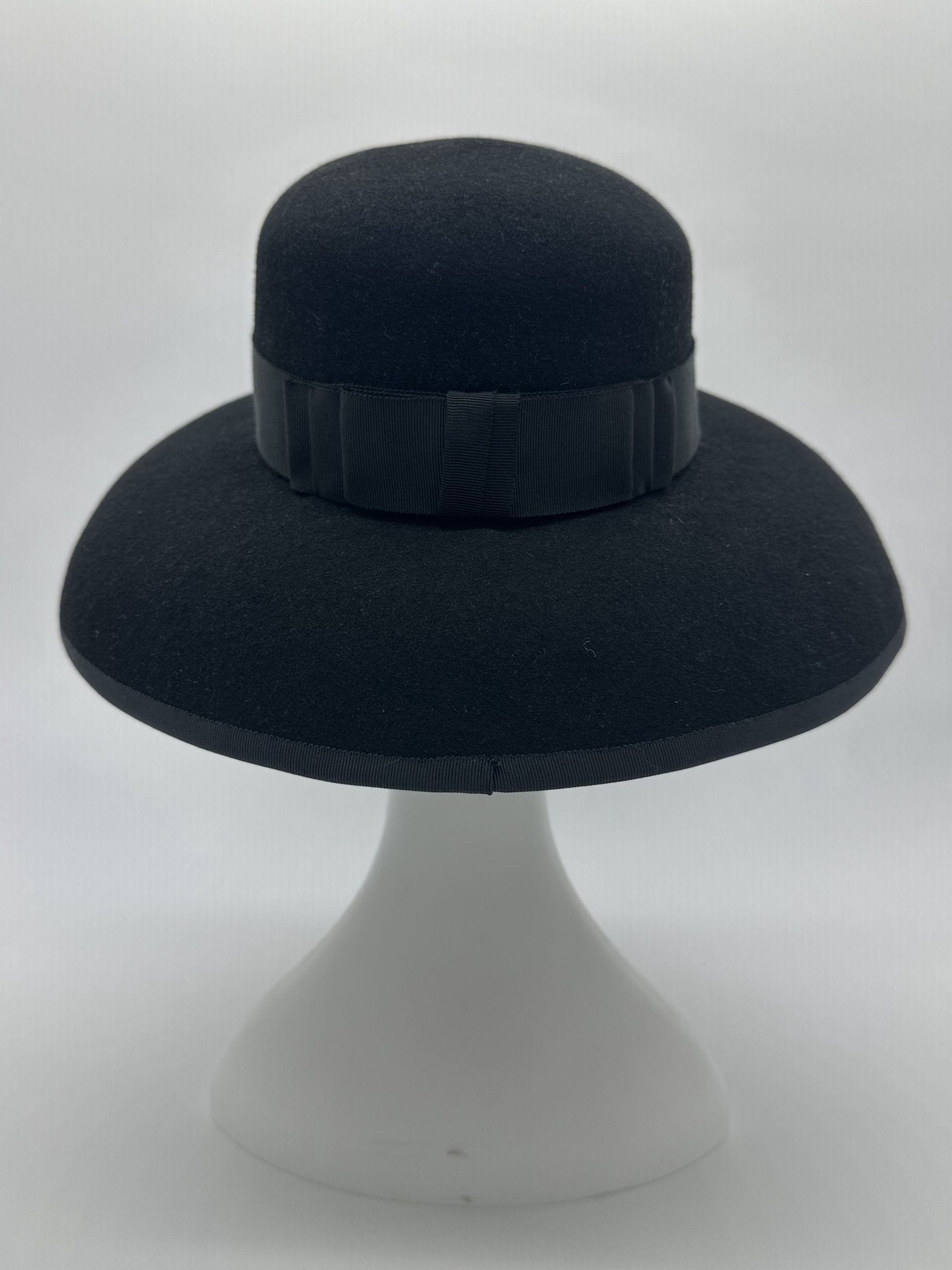 Black felt drop brim hat inspired by Audrey Hepburn in Breakfast at Tiffanys by Australian milliner Sydney milliner Abigail Fergusson Millinery