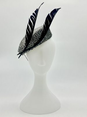 Monochrome Black and white animal print teardrop pillbox hat with angled feathers by Australian Milliner Abigail Fergusson available instore at the Milliner's Closet perfect for Championships Day 1 or Derby Day races
