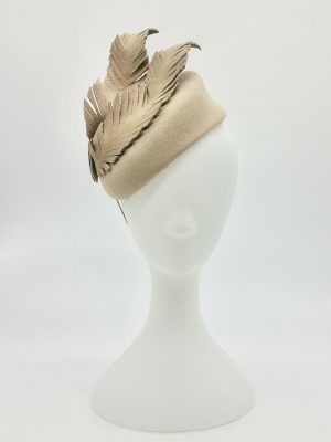 Autumn Winter Racing Millinery Racewear Creamfur felt duchess shaped cocktail hat with sculpted two tone leather feathers by Sydney Milliner Australian Milliner Hatmaker Abigail Fergusson Millinery.