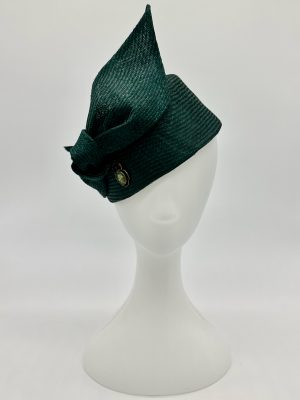 FOTF Fashions on the Field Spring Racing Millinery Racewear teal green pillbox hat trimmed with scarab jewel and knotted bow by Australian Milliner, Abigail Fergusson Millinery, in store at The Milliner's Closet in Balgowlah in Sydney's Northern Beaches, perfect for the Melbourne Cup, The Everest and Magic Millions Carnivals.